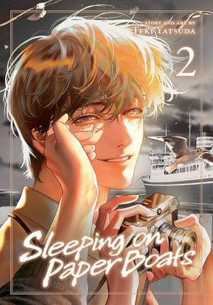 Yatsuda, Teki. Sleeping on Paper Boats, Vol. 2. Viz Media, Subs. of Shogakukan Inc, 2026.