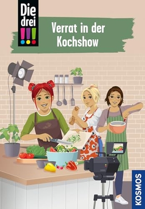 Heger, Ann-Katrin. Die drei !!!, 122, Verrat in der Kochshow - Spannender Kinderkrimi ab 10 Jahren über Freundschaft, Teamgeist und clevere Detektivinnen mit jeder Menge Power. Franckh-Kosmos, 2026.
