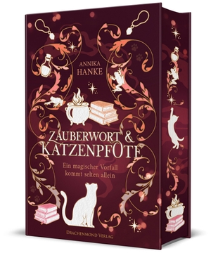 Hanke, Annika. Zauberwort & Katzenpfote - Ein magischer Vorfall kommt selten allein - Romantische Wohlfühl-Fantasy in einem süßen Buchladen | mit Farbschnitt-Garantie. Drachenmond-Verlag, 2026.